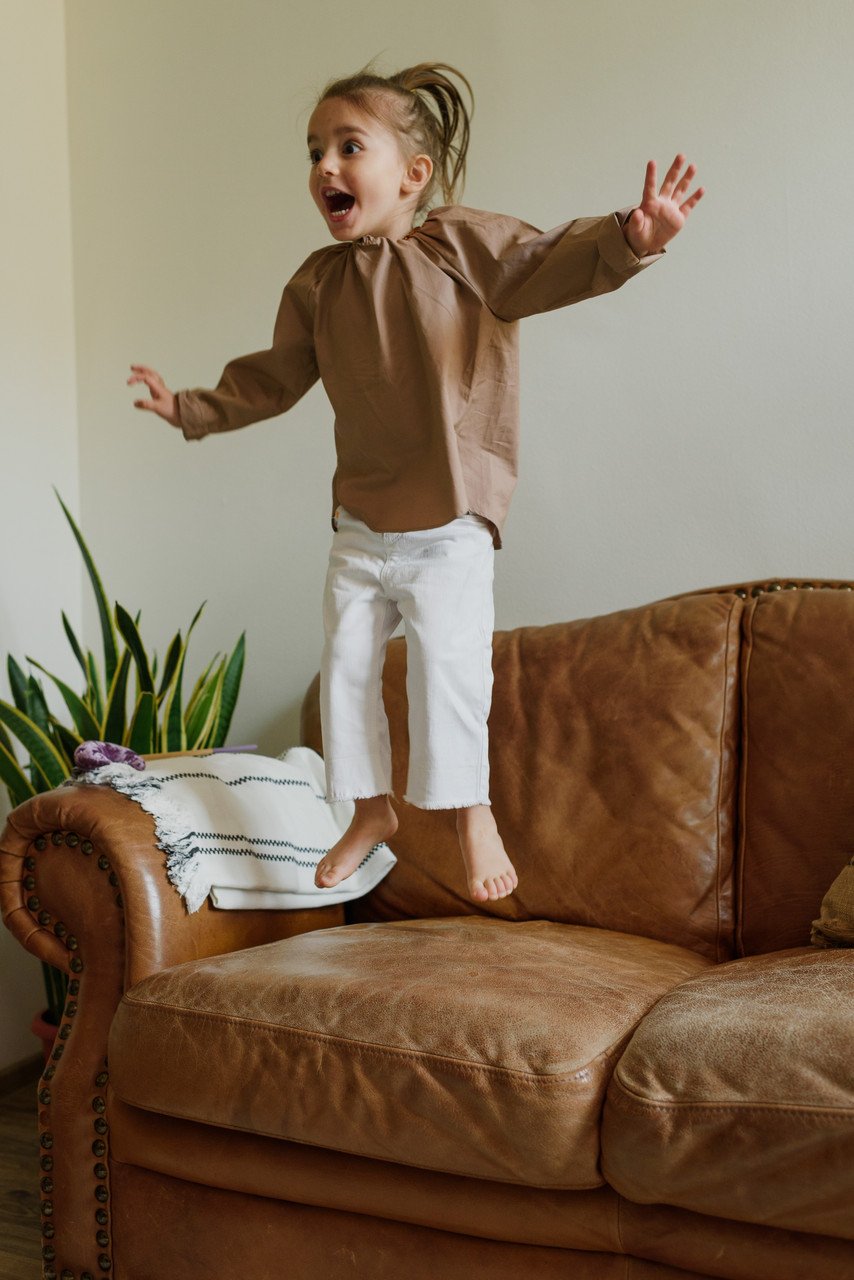 Young girl playing happily